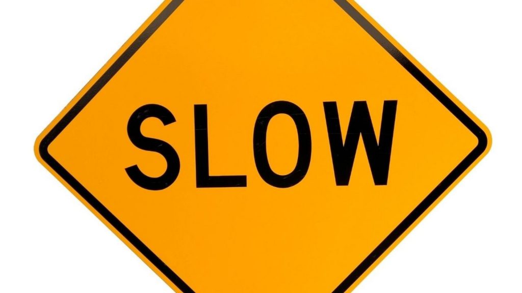 Traffic slow sign