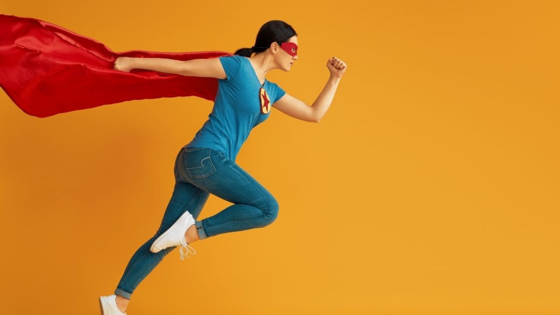 Superwoman on orange background